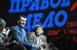 На фото: 2011 год. Президент группы ОНЭКСИМ и новый лидер партии